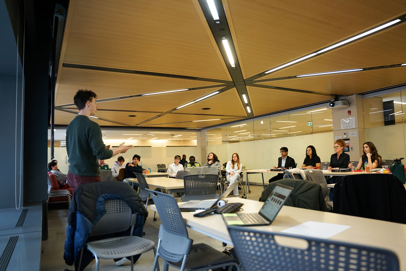 Students presenting at the McGill Data Network AI Hackathon