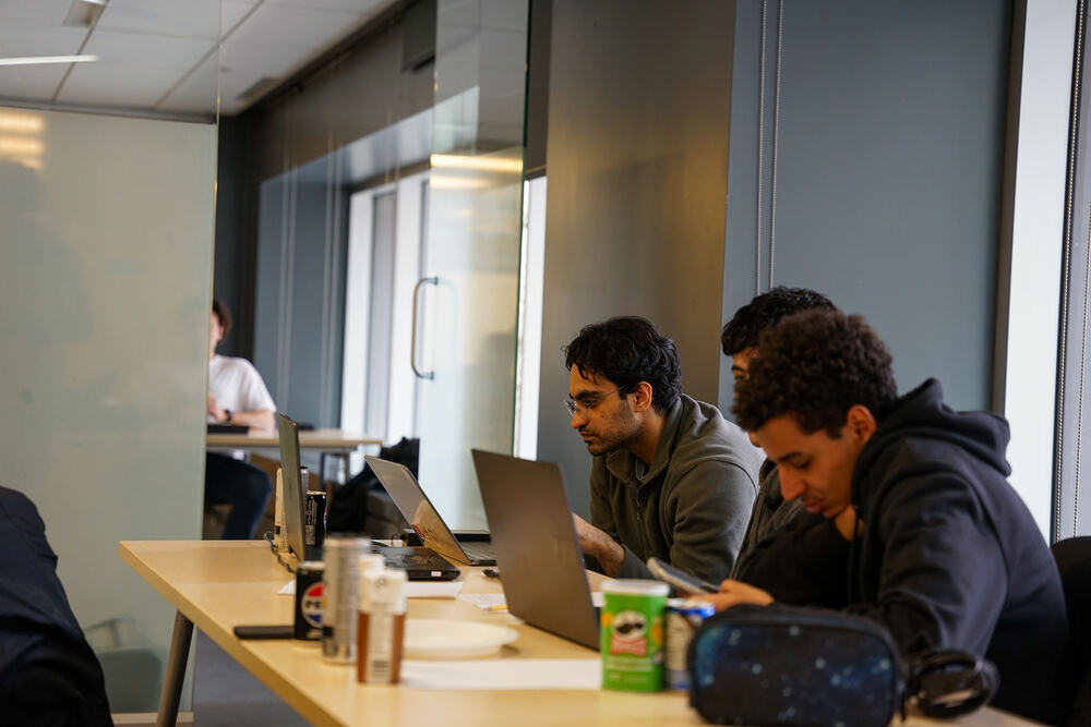 Students working through a hands-on technical workshop at McGill Data Network
